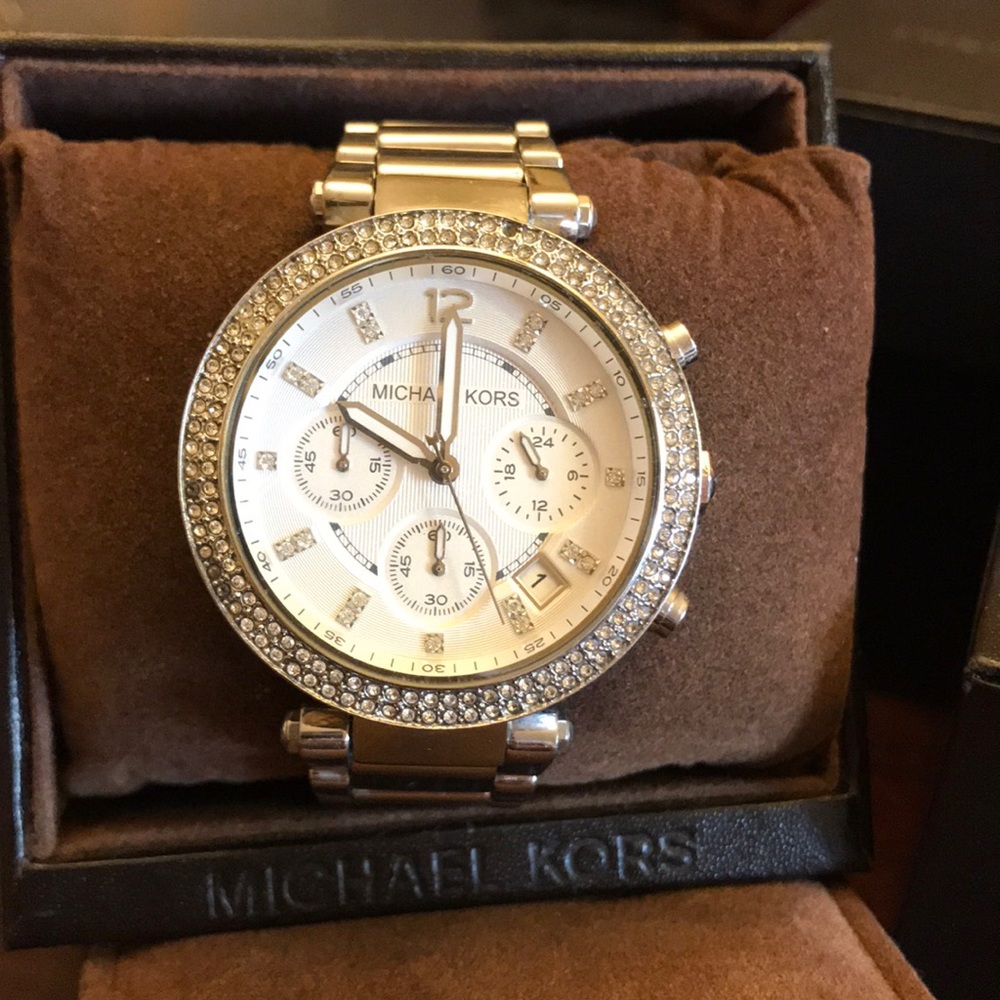 Silver MK watch